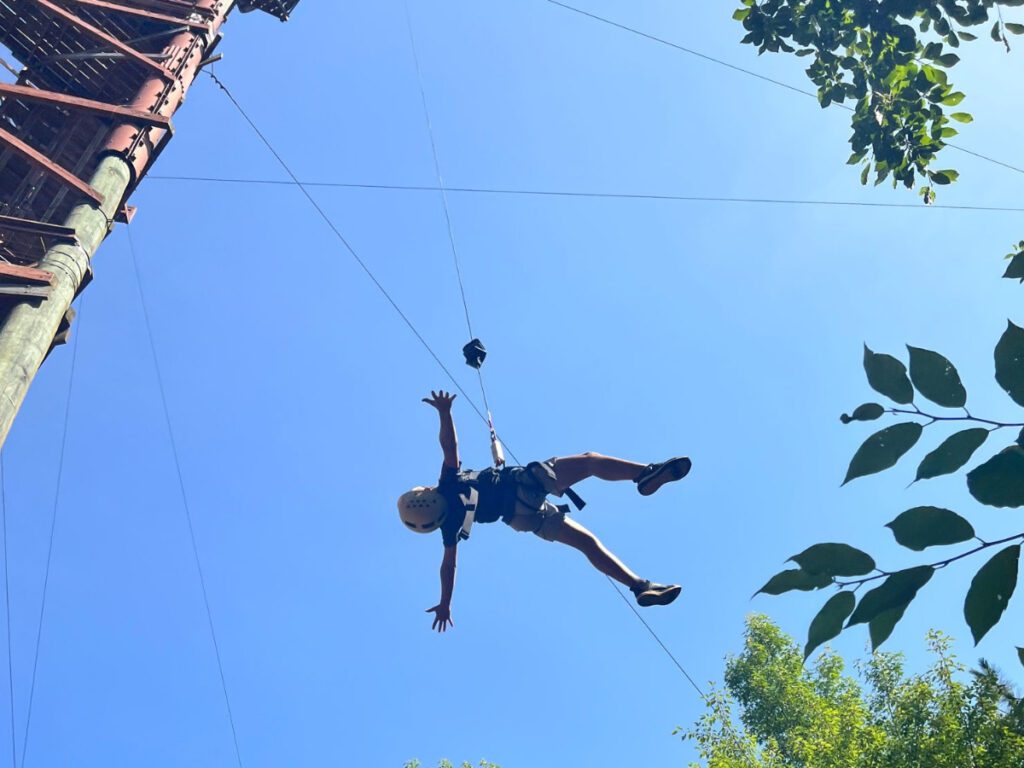 summer camper enjoys the free fall