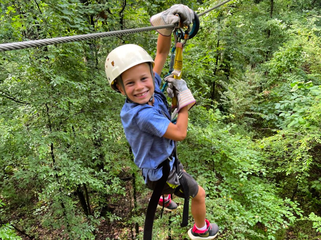 young camper zip lining