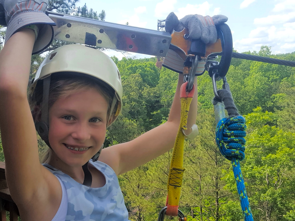 young girl about to zip line