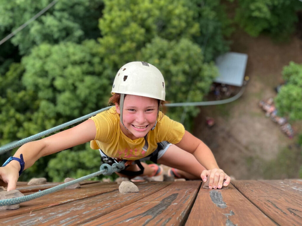 At the top of the World's Tallest Free-Standing Climbing Wall - Guinness Certified!