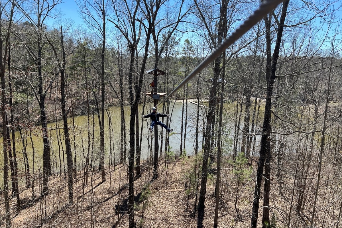 winter ziplining through the trees on two springs tour